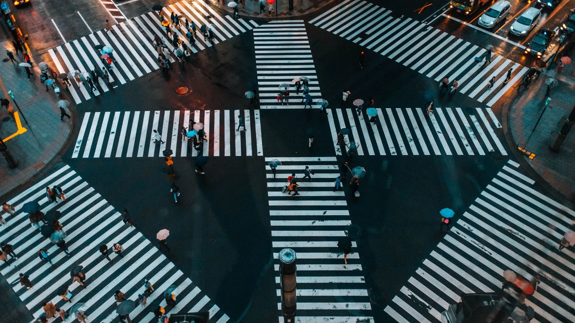An aerial view of a four way cross walk in Tokyo Japan