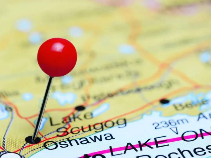 A pin on a map over the city of Oshawa Canada