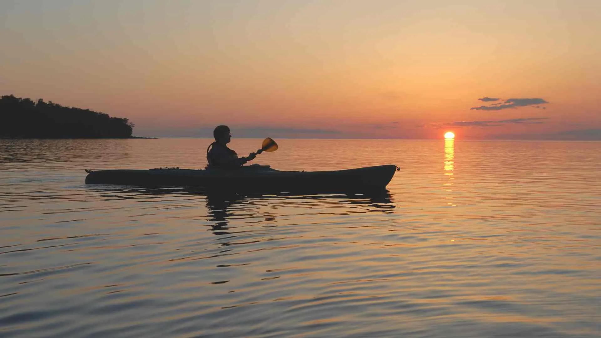 sunset kayak lake michigan