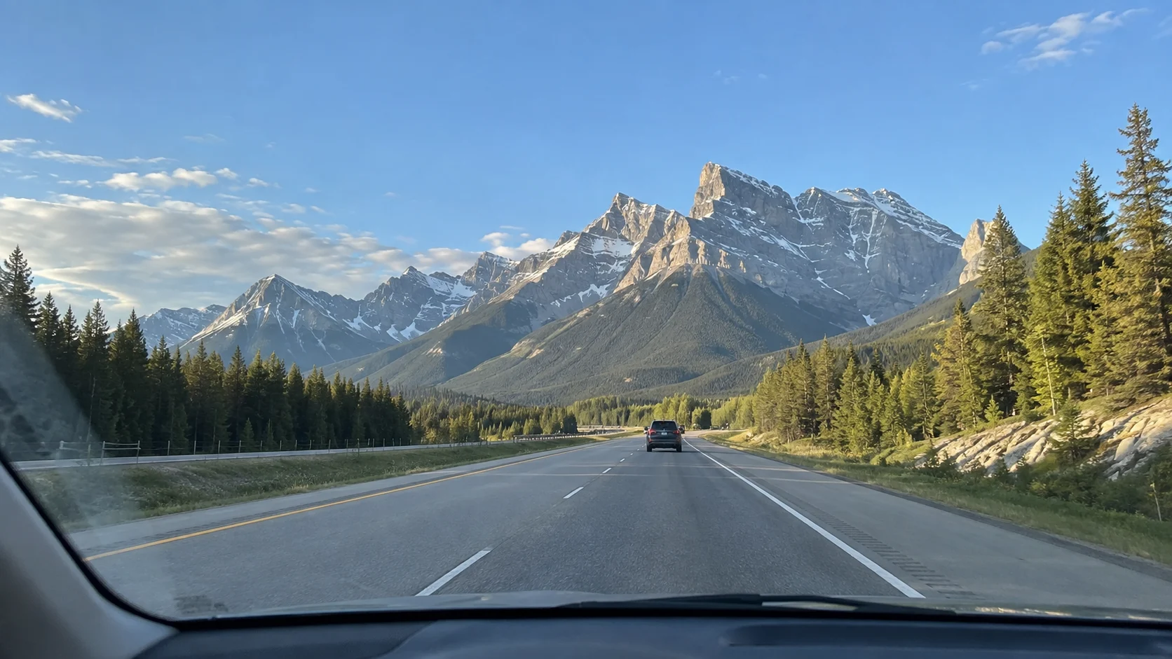 Driver's-eye view of the Canadian Rockies on the highway from Calgary to Banff