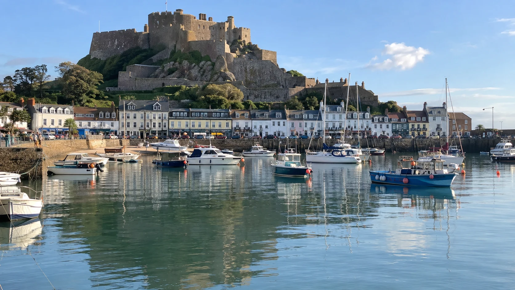 Mont Orgueil Castle rising above Gorey harbor on the island of Jersey