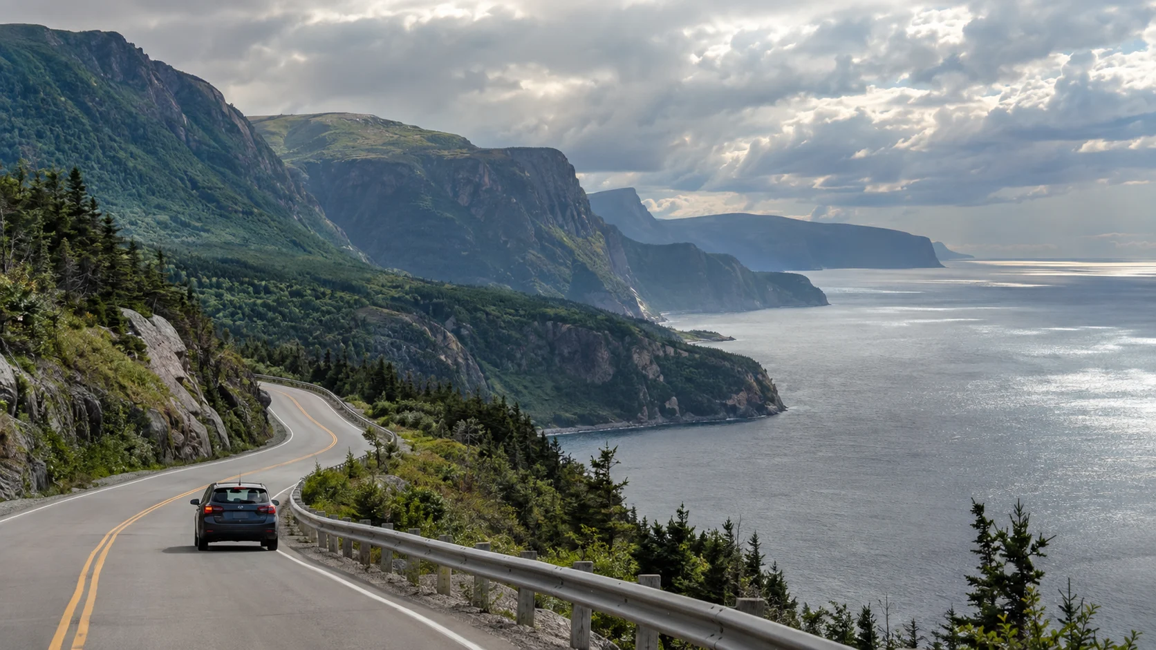 A winding coastal road through the mountains and coves of western Newfoundland