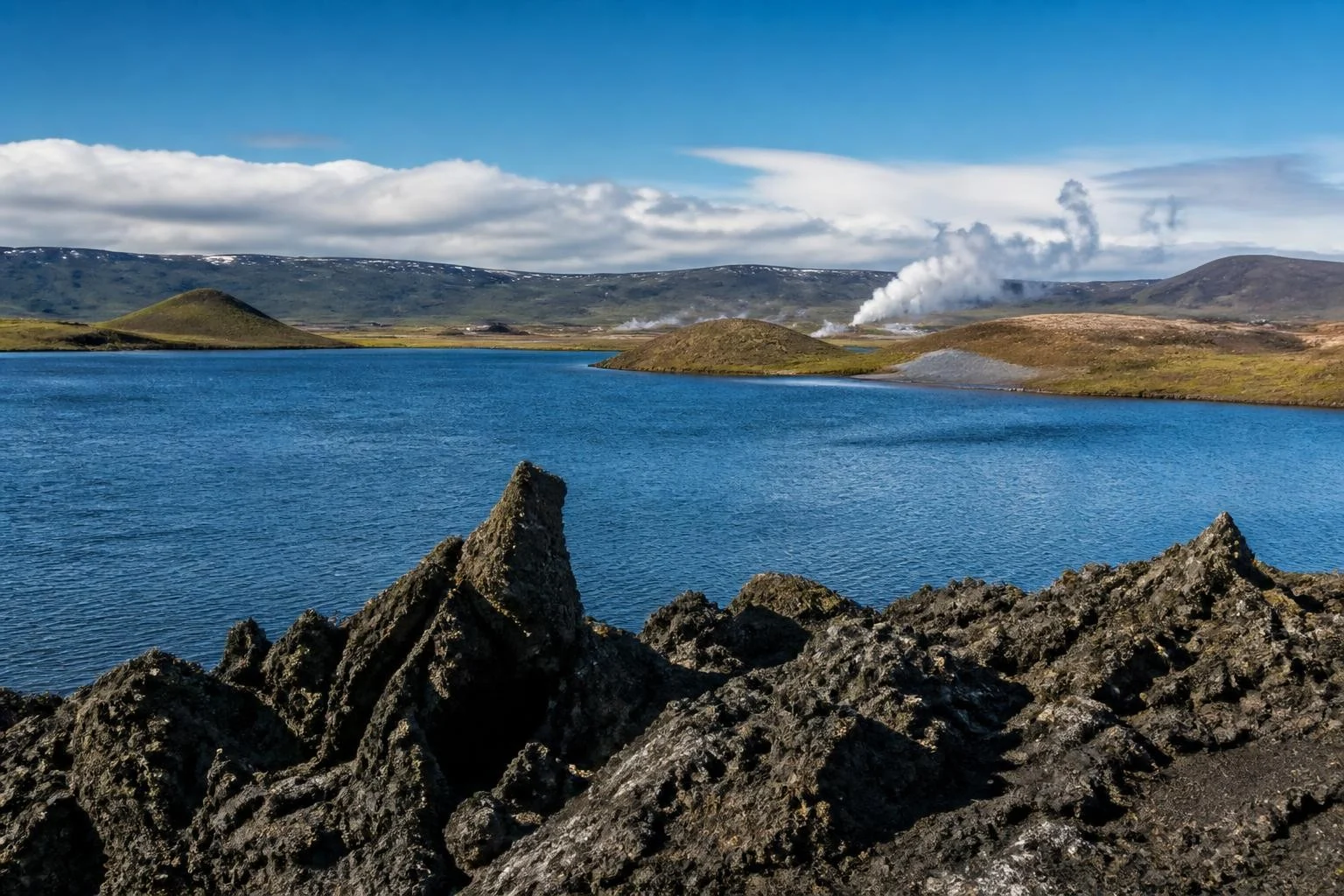 Lake Myvatn with volcanic formations and geothermal landscape