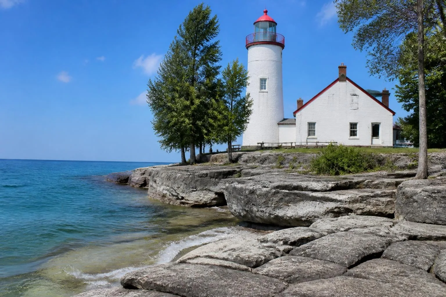 Marblehead Lighthouse beside the rocky Lake Erie shoreline