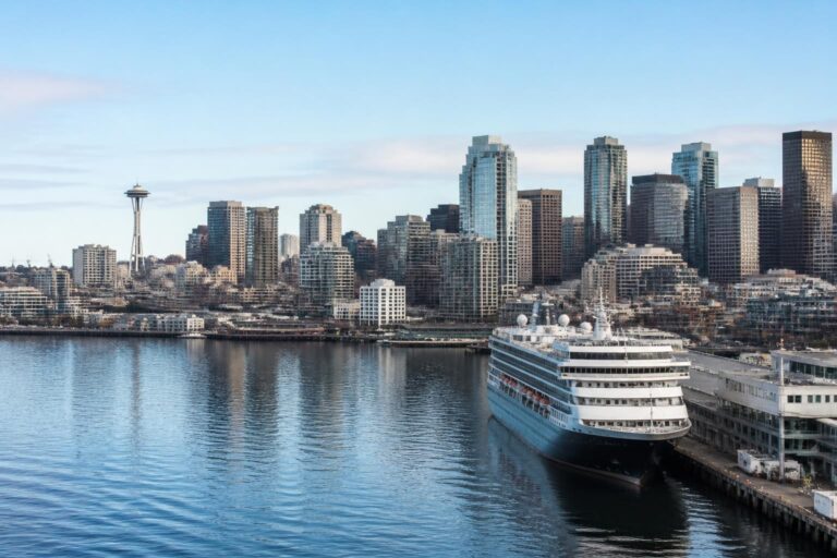 Seattle waterfront and skyline with a cruise ship docked nearby