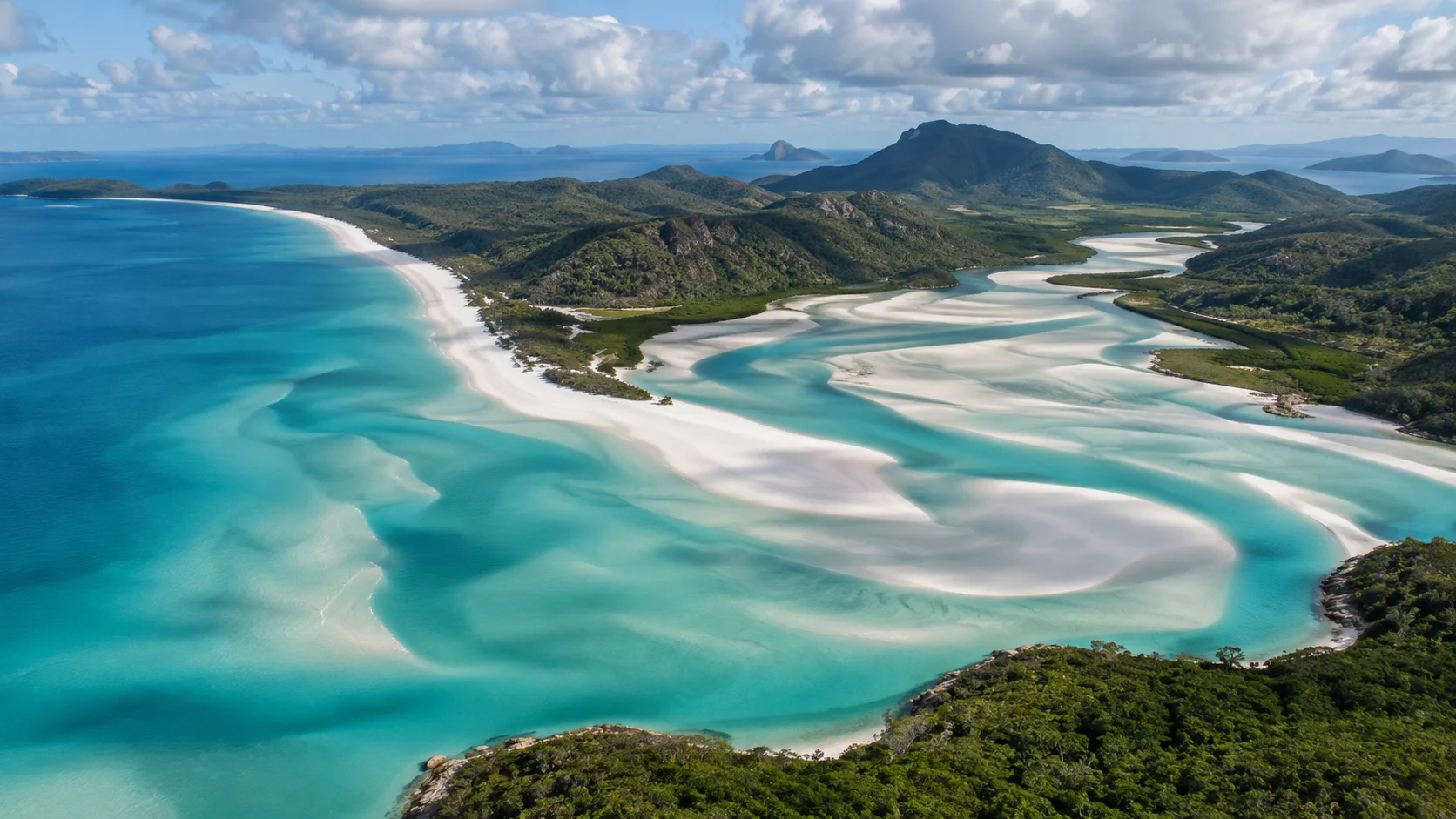 White silica sandbars and turquoise channels at Hill Inlet in the Whitsundays