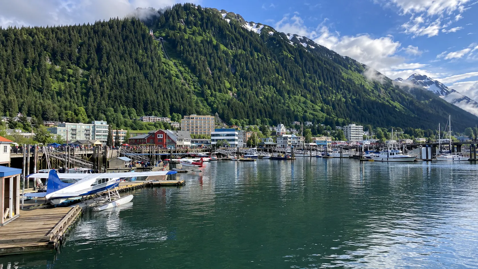Juneau waterfront and Mount Roberts viewed from the harbor on a clear summer morning