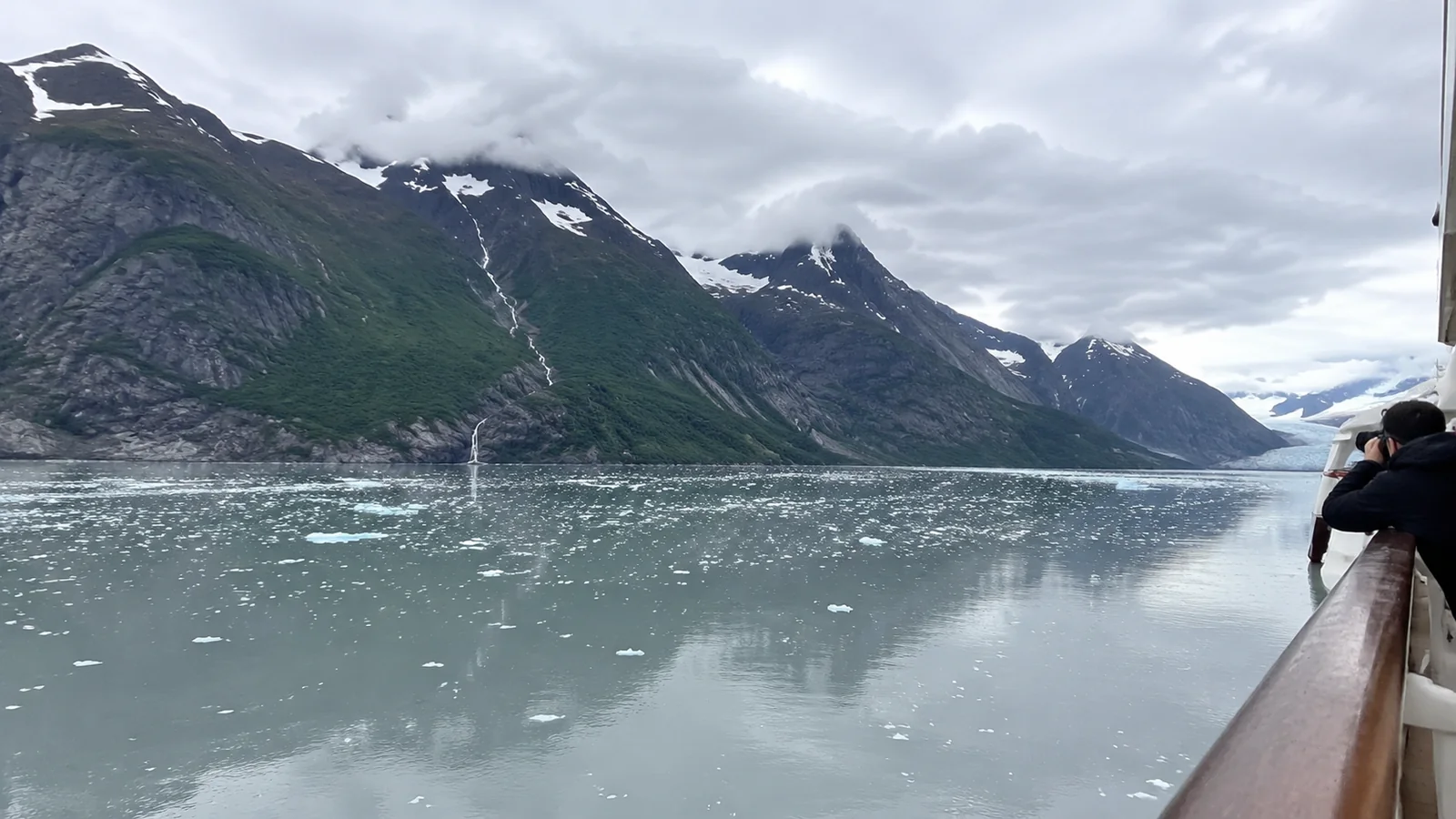 Mountain bay with floating ice viewed from a cruise ship
