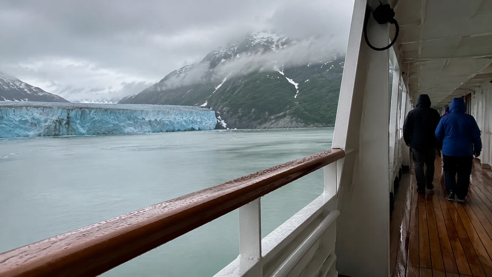 Glacier viewed from a wet cruise ship promenade