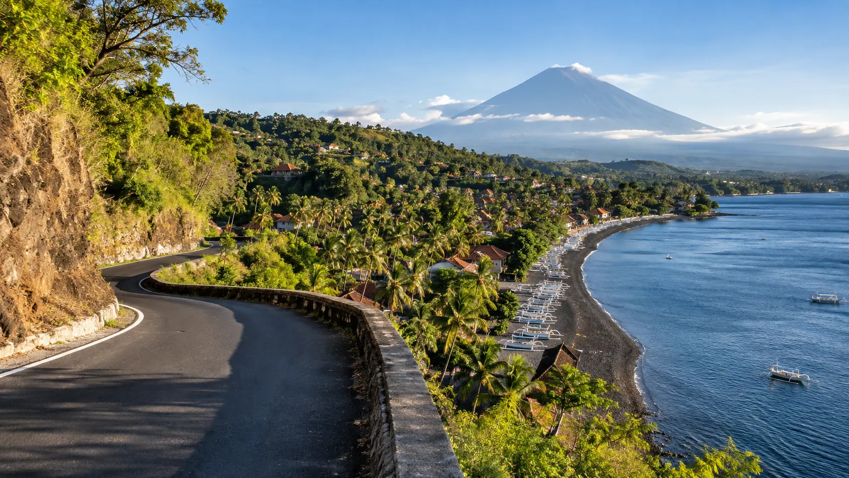 Winding coastal road overlooking Amed's beaches and fishing villages.