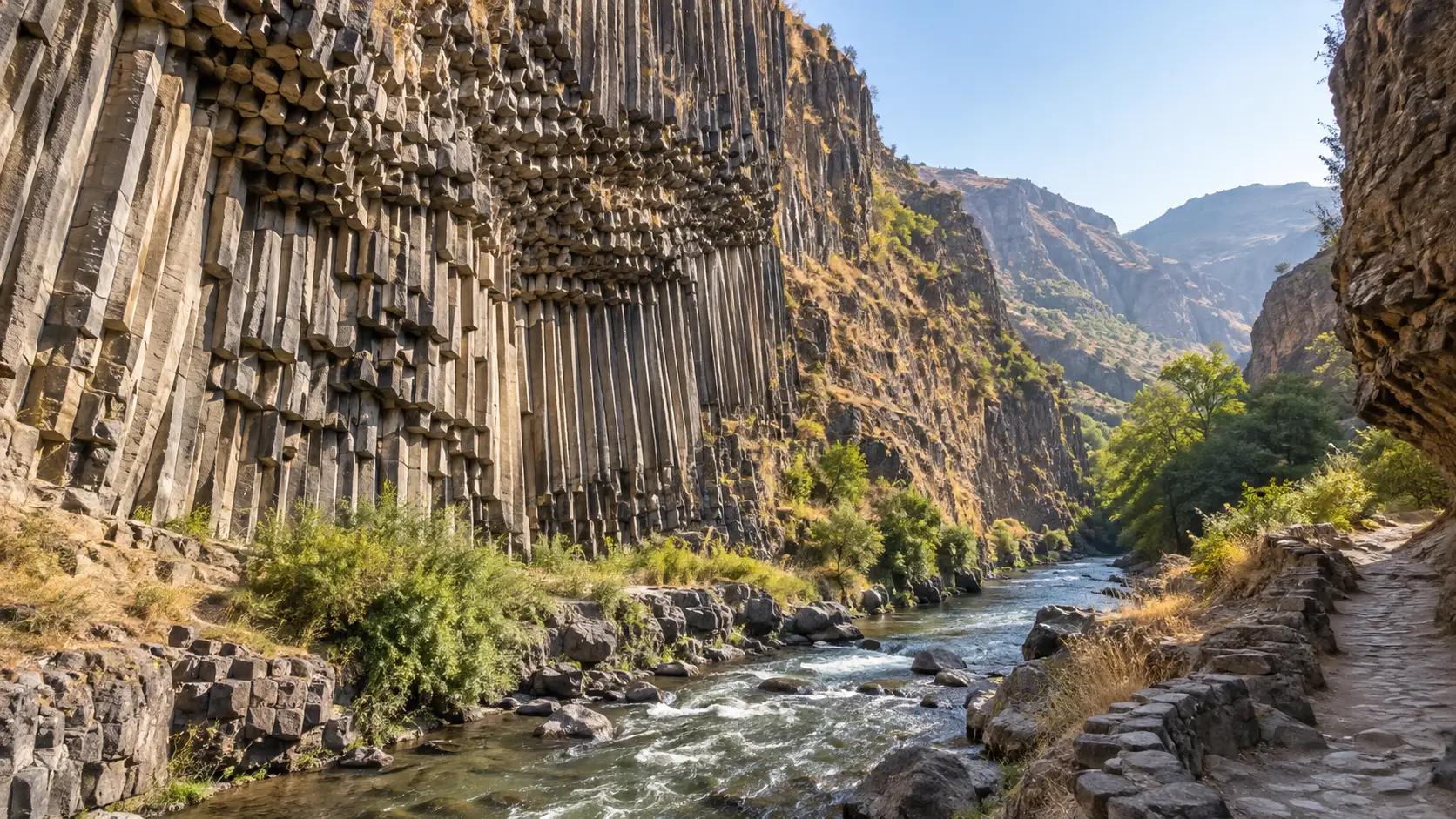 Basalt columns tower above the Azat River in Armenia's Garni Gorge.