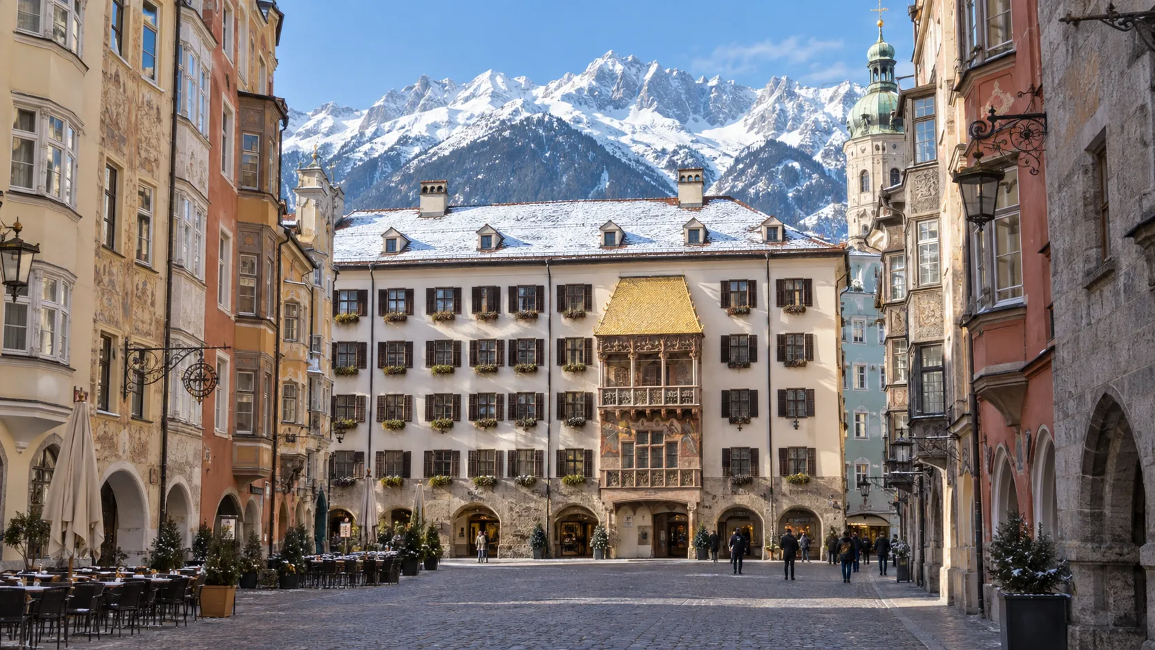 The Golden Roof in Innsbruck Old Town with the snowy Nordkette behind it.