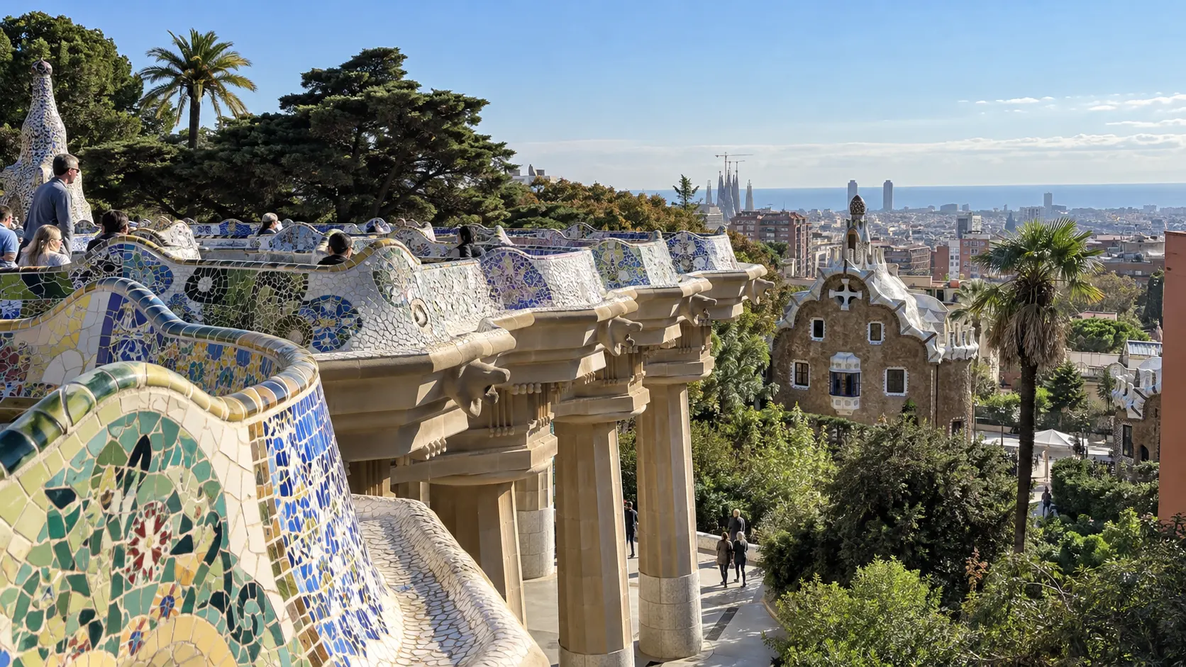 Mosaic terrace and whimsical stonework inside Park Güell.
