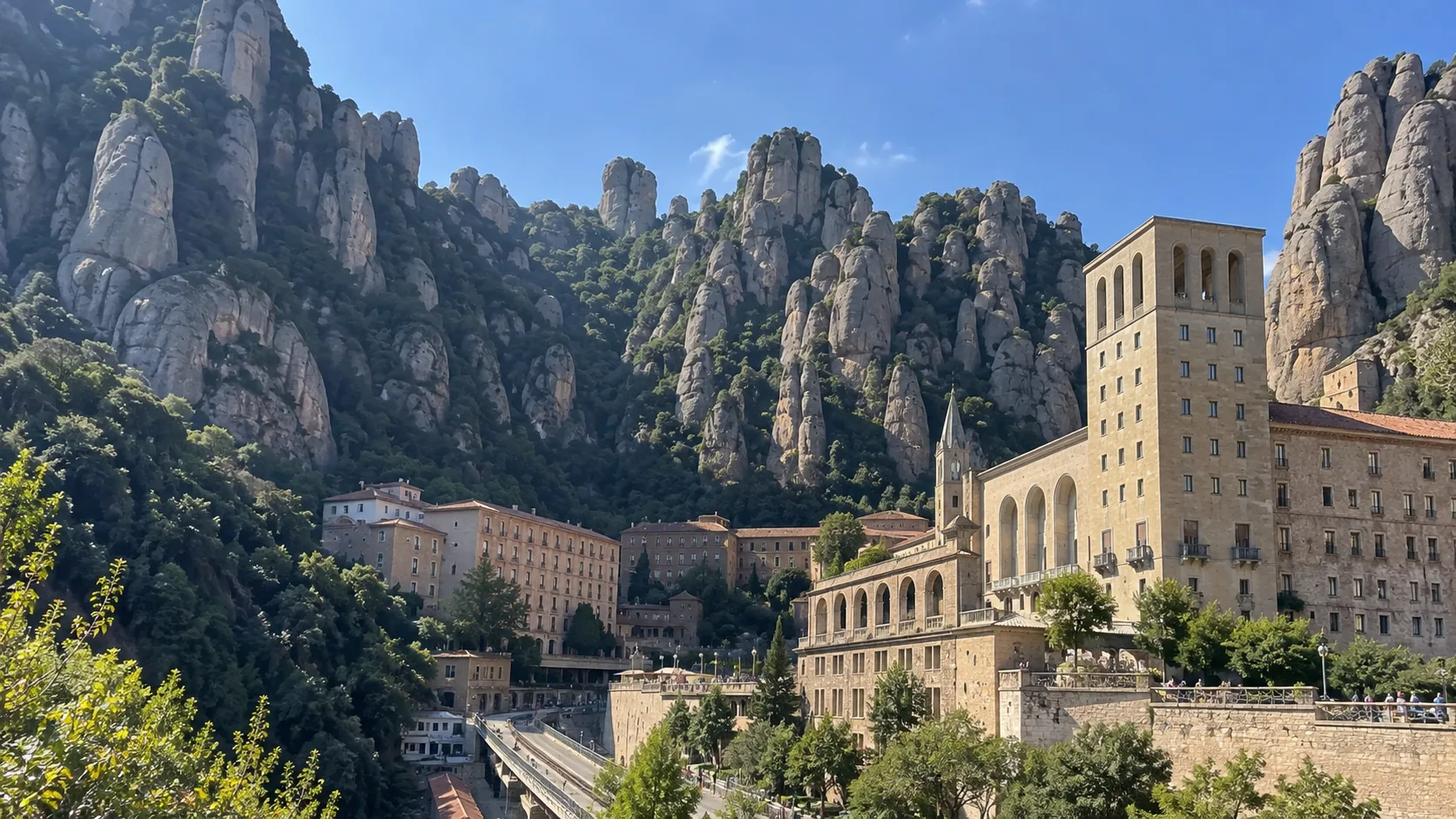 Montserrat monastery beneath jagged Catalan mountain peaks.