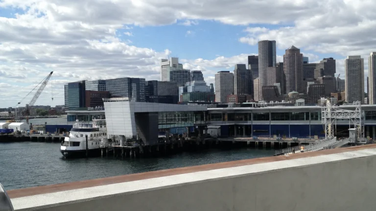 Boston waterfront terminal with the downtown skyline across the harbor.