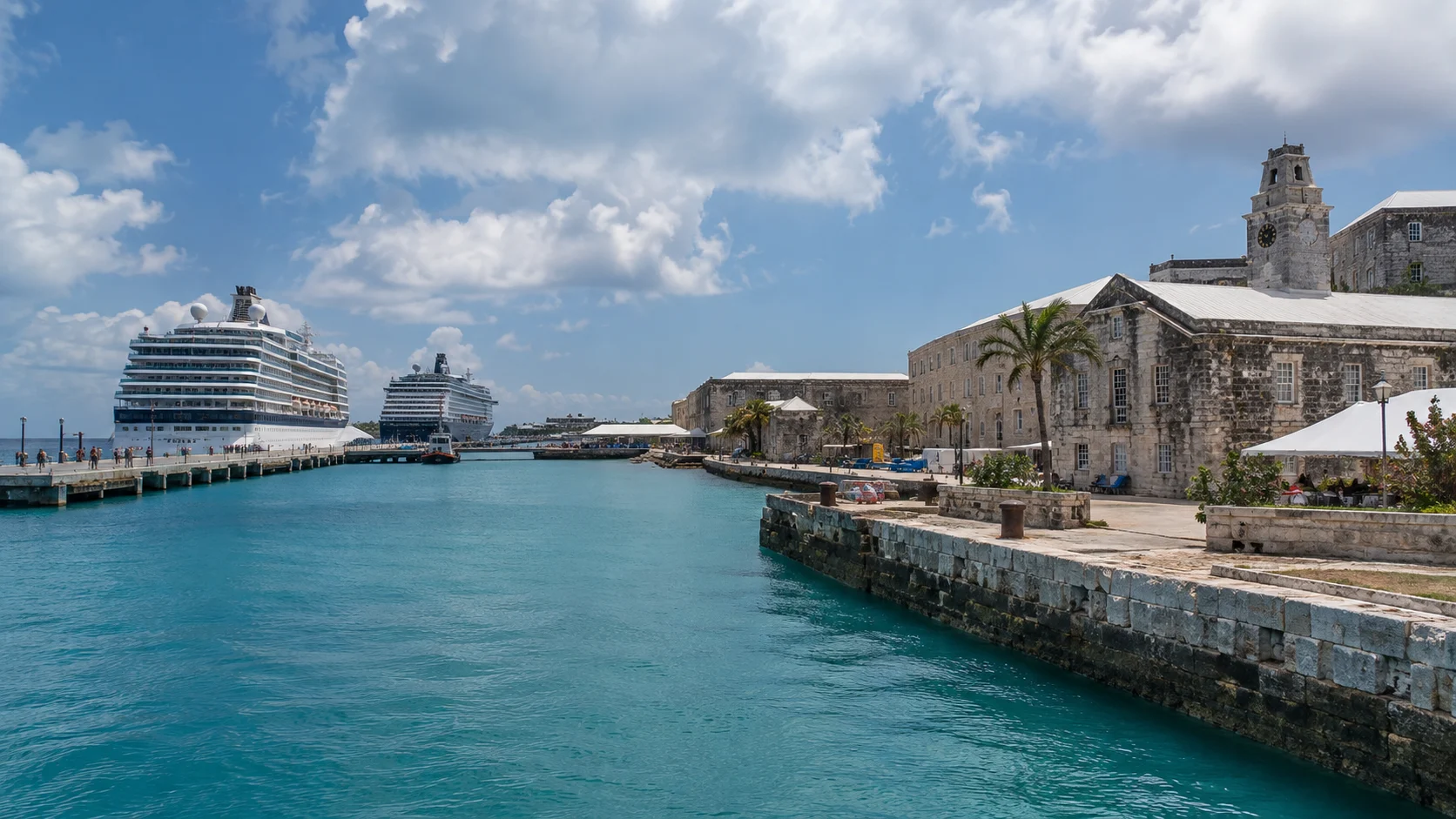 Royal Naval Dockyard and King's Wharf beside turquoise water.