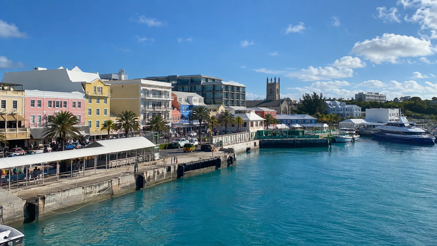 Pastel Front Street buildings along Hamilton Harbour.