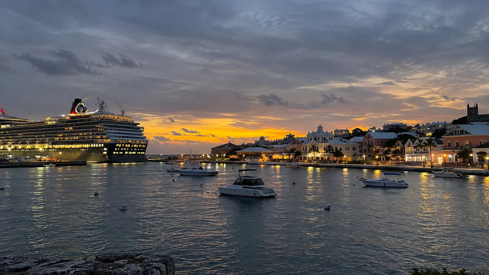 Bermuda harbor and cruise ship illuminated during an overnight call.