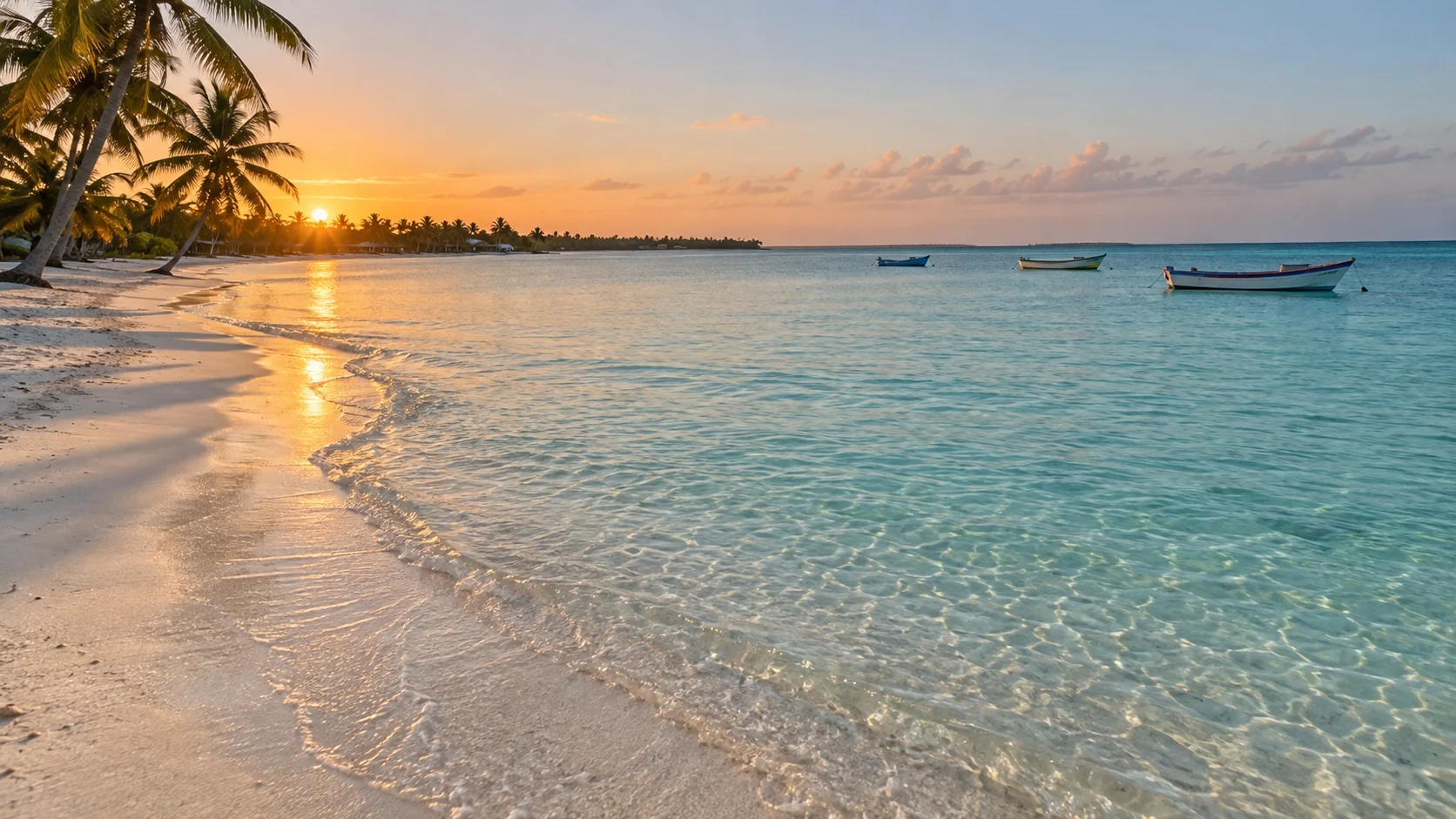 Shallow turquoise water, white sand and fishing skiffs at Boca Chica beach near Santo Domingo.