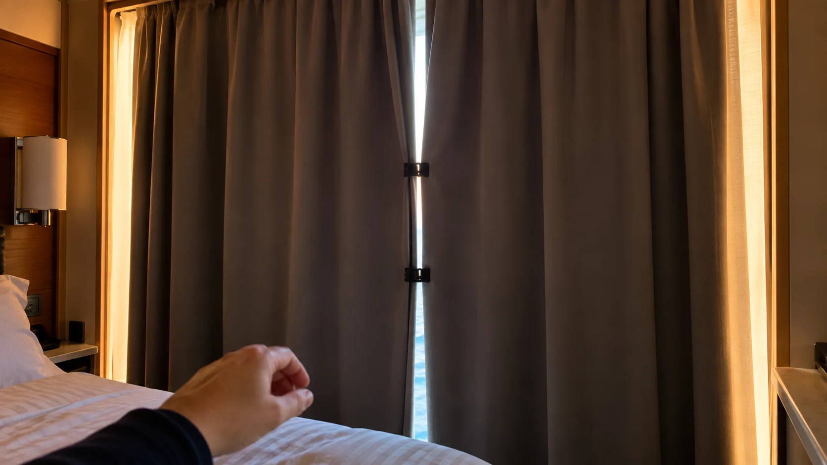 Small clips closing the center gap in cruise cabin blackout curtains