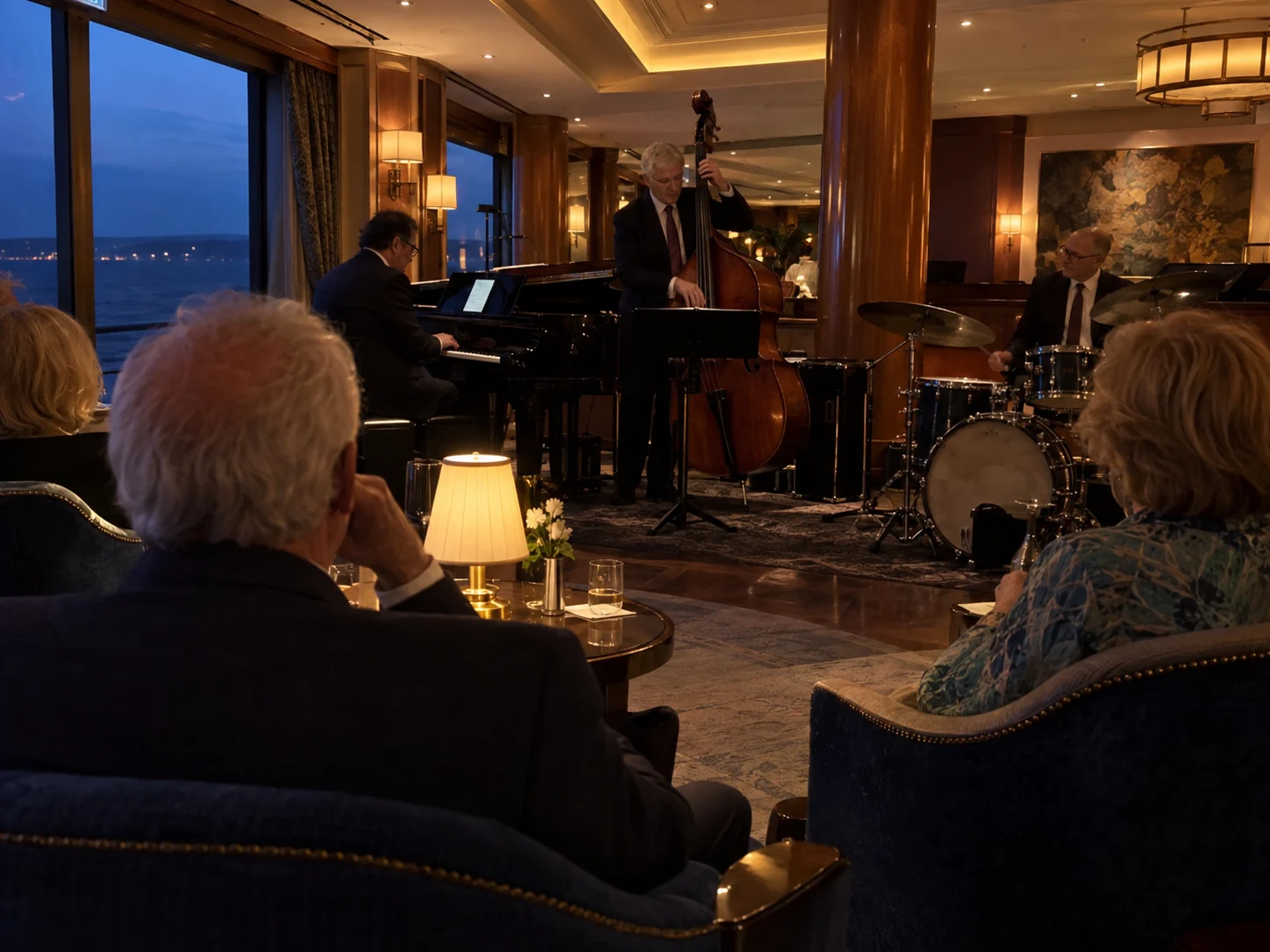 Older passengers listening to a jazz trio in a classic cruise lounge.