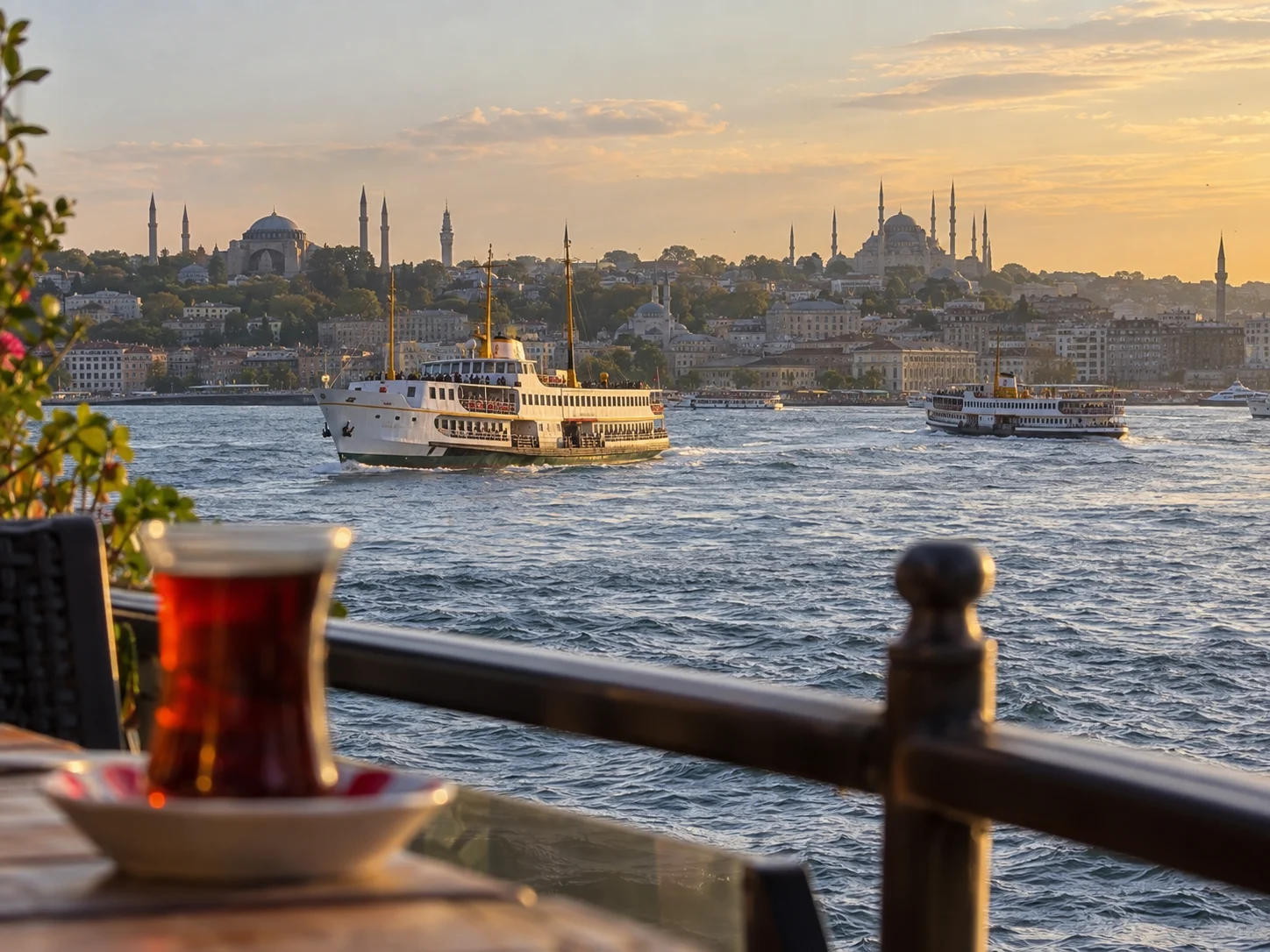 Ferries cross the Bosphorus before Istanbul's domes and minarets.