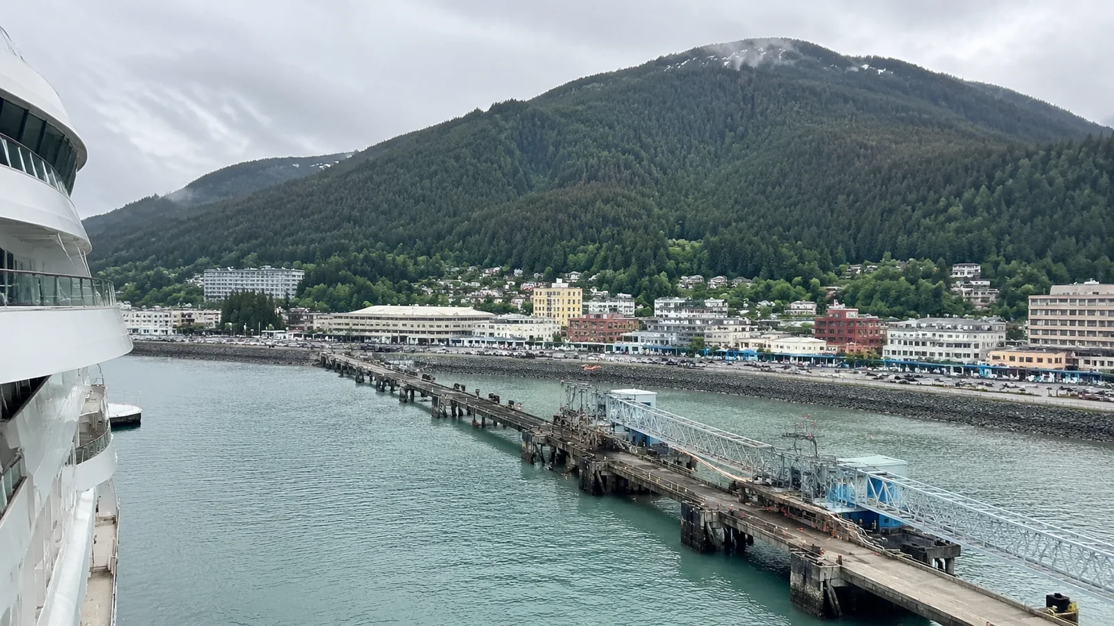 Mountain harbor and town viewed from a cruise ship