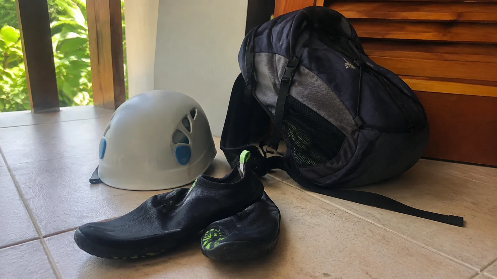 Helmet, water shoes and backpack ready for an excursion.