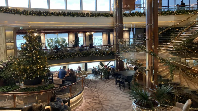 Ship atrium decorated with a Christmas tree and garlands.