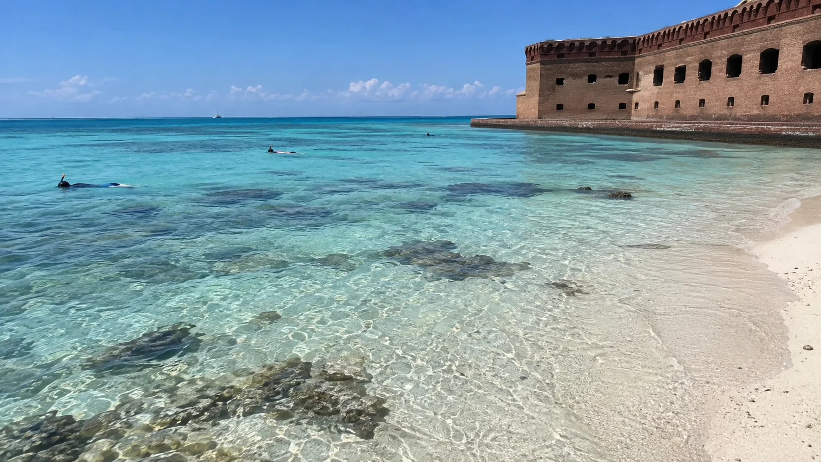 Clear shallow water and coral patches in the designated Garden Key snorkel area.