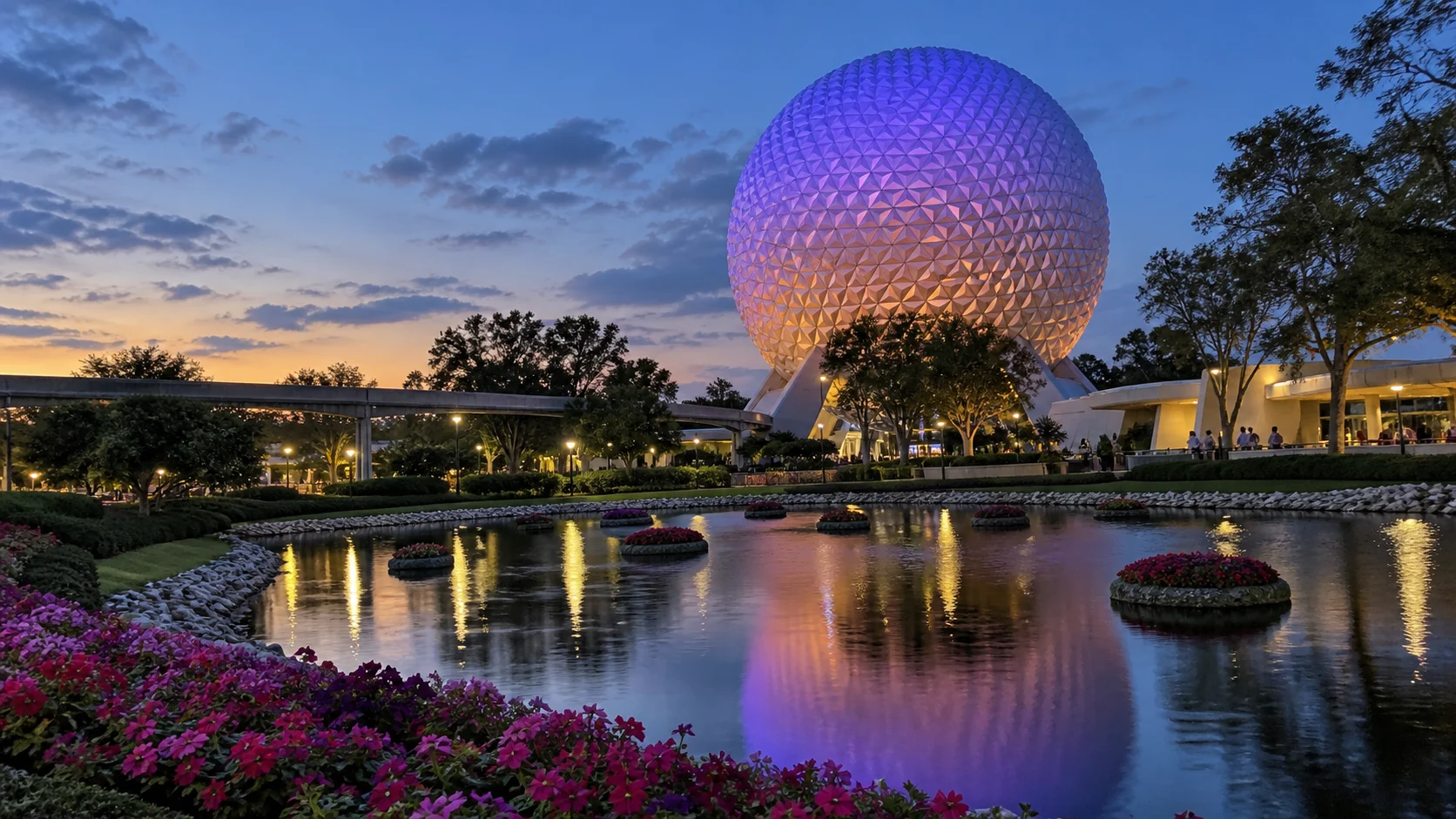 Spaceship Earth reflected in EPCOT gardens at blue hour