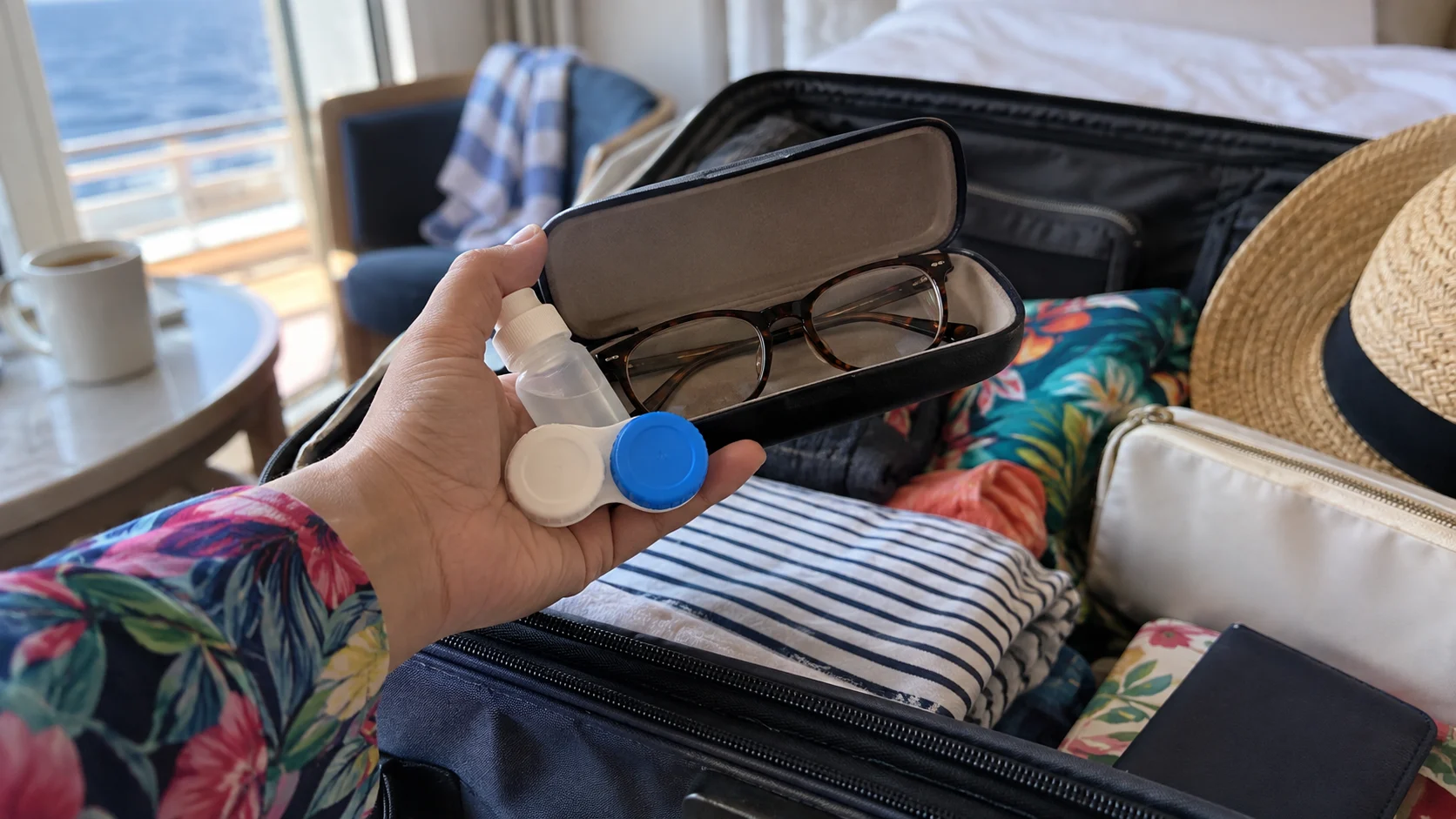 Backup eyeglasses and contact lens supplies being packed for a cruise