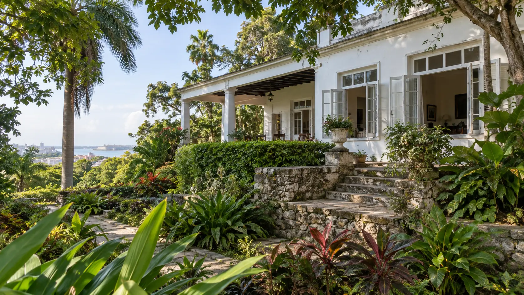 White hilltop house and tropical garden at Finca Vigía.