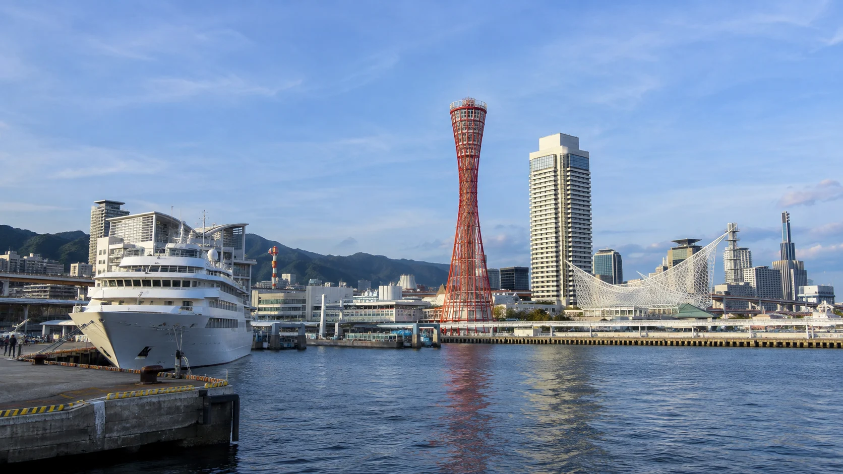 Kobe Port Tower and harbor skyline from the cruise port.