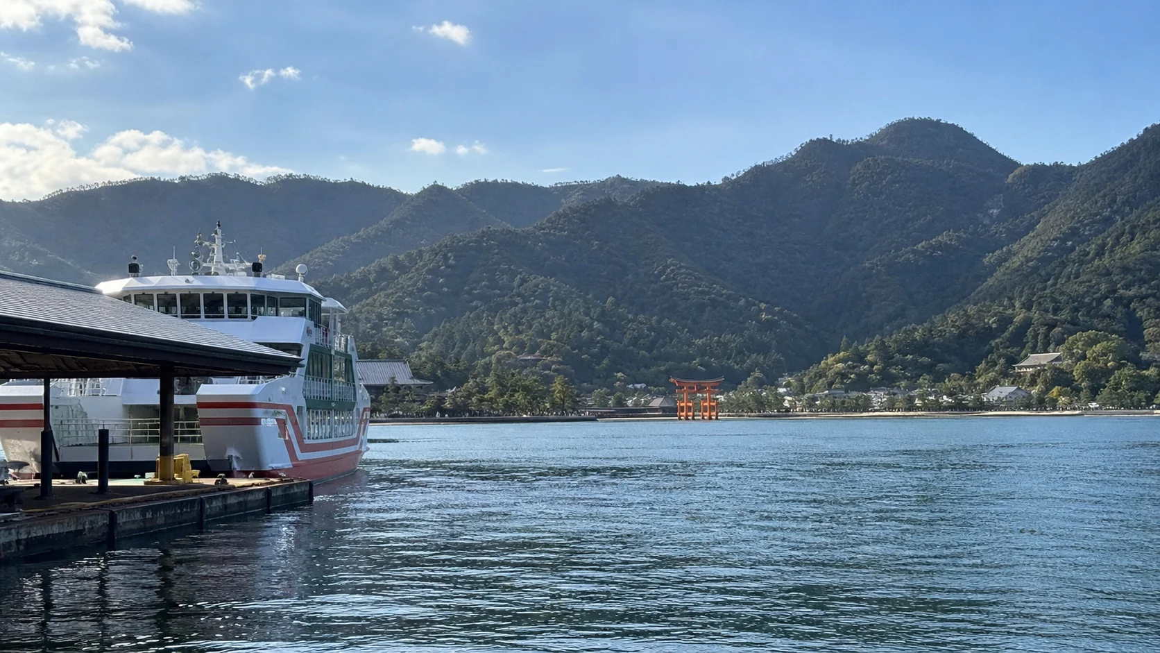 Hiroshima port-day ferry crossing toward Miyajima.