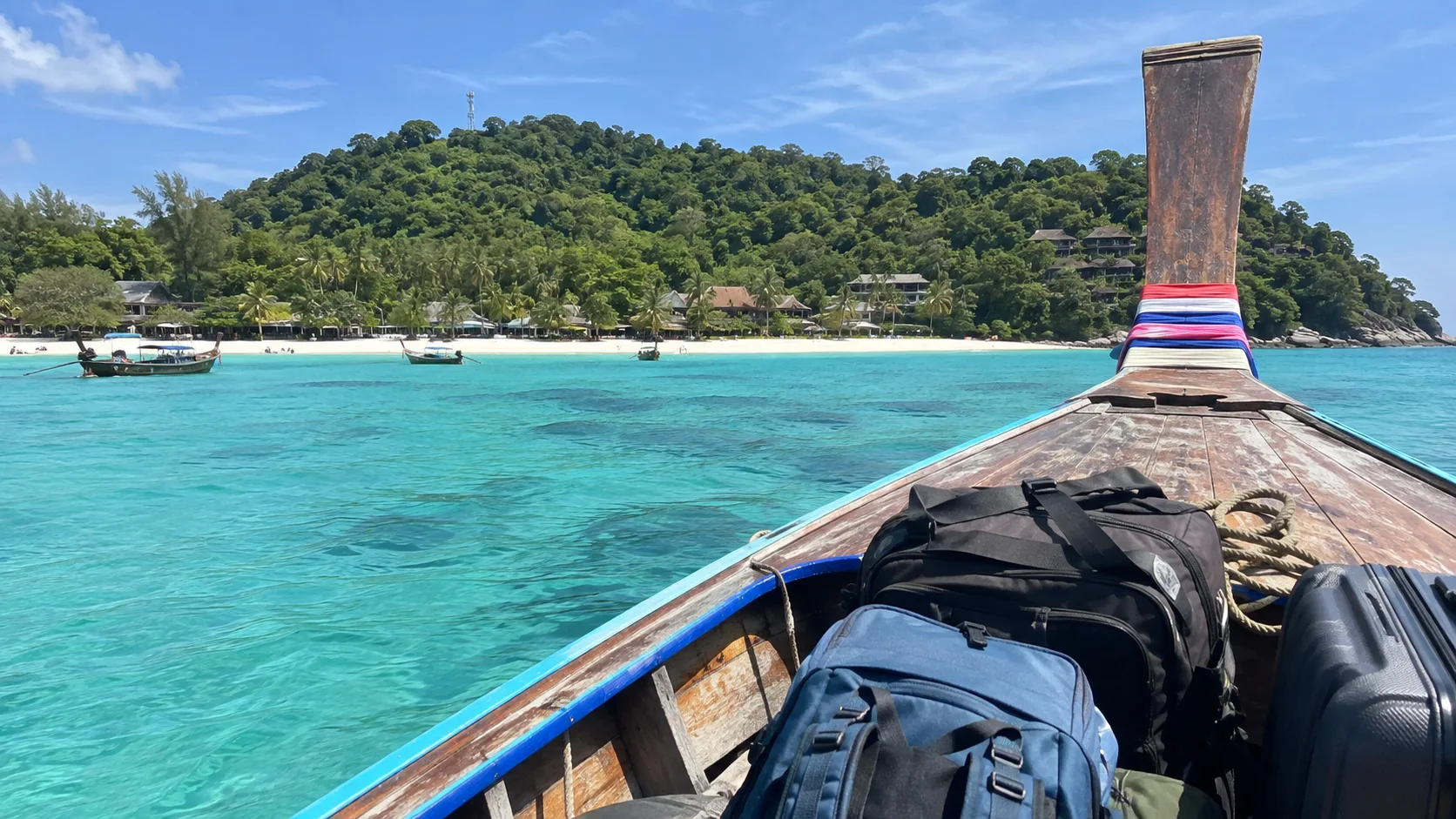 Boat arrival at Koh Lipe across turquoise water