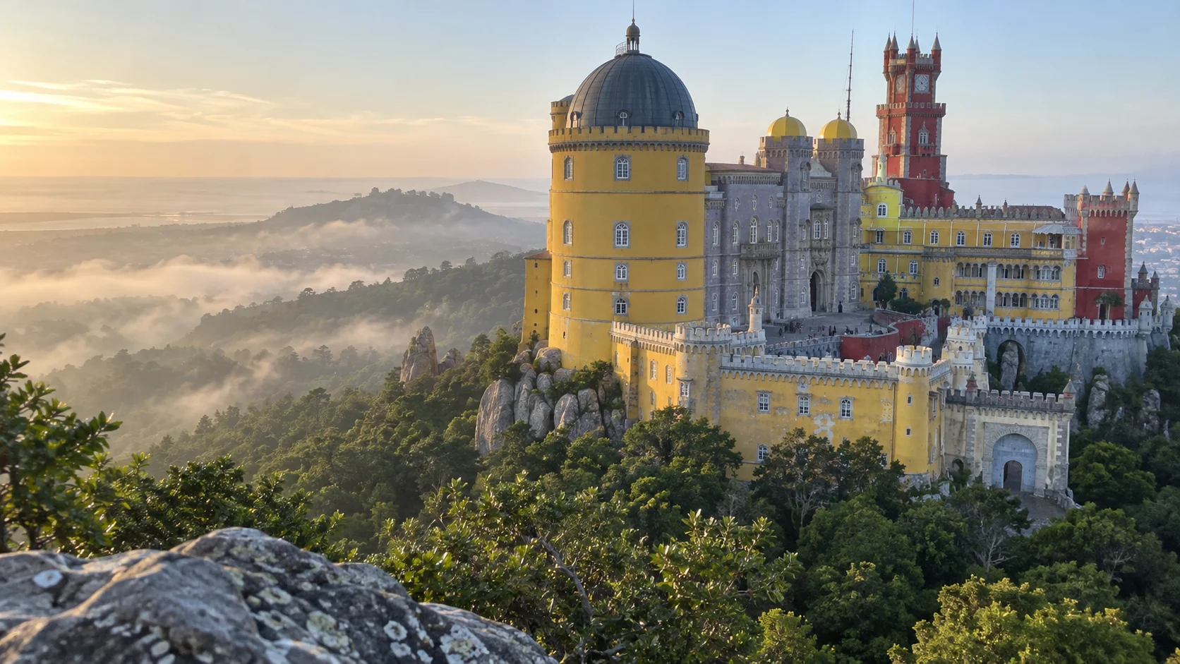 Pena Palace above the misty forest in Sintra