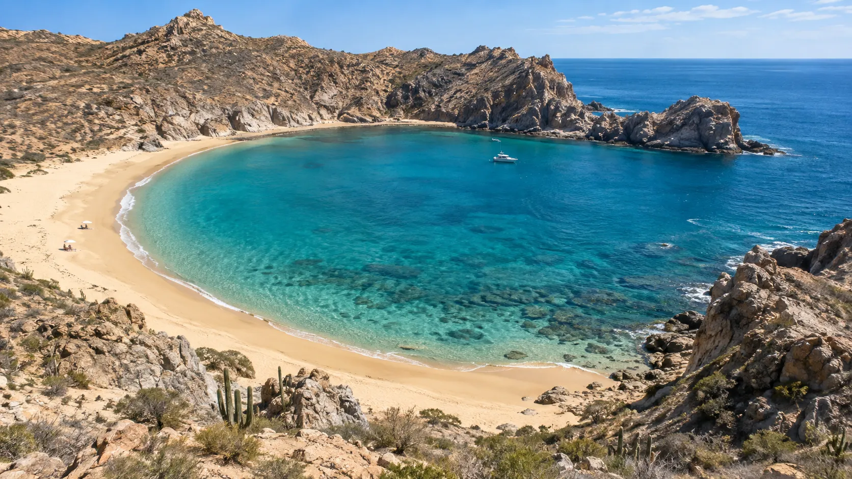 Santa Maria Bay forms a horseshoe of golden sand around clear blue water.