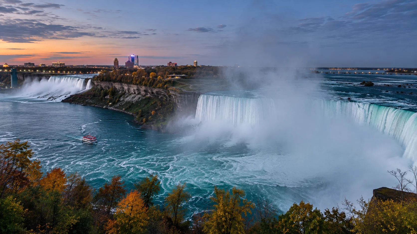Horseshoe Falls and the American Falls at Niagara during autumn blue hour