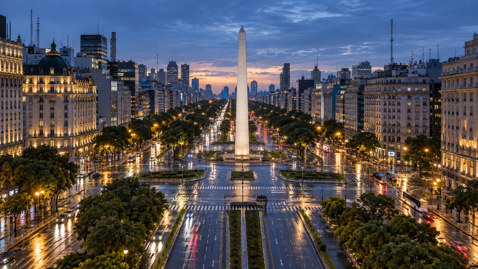 Buenos Aires' Obelisk centered above the broad Avenida 9 de Julio at blue hour