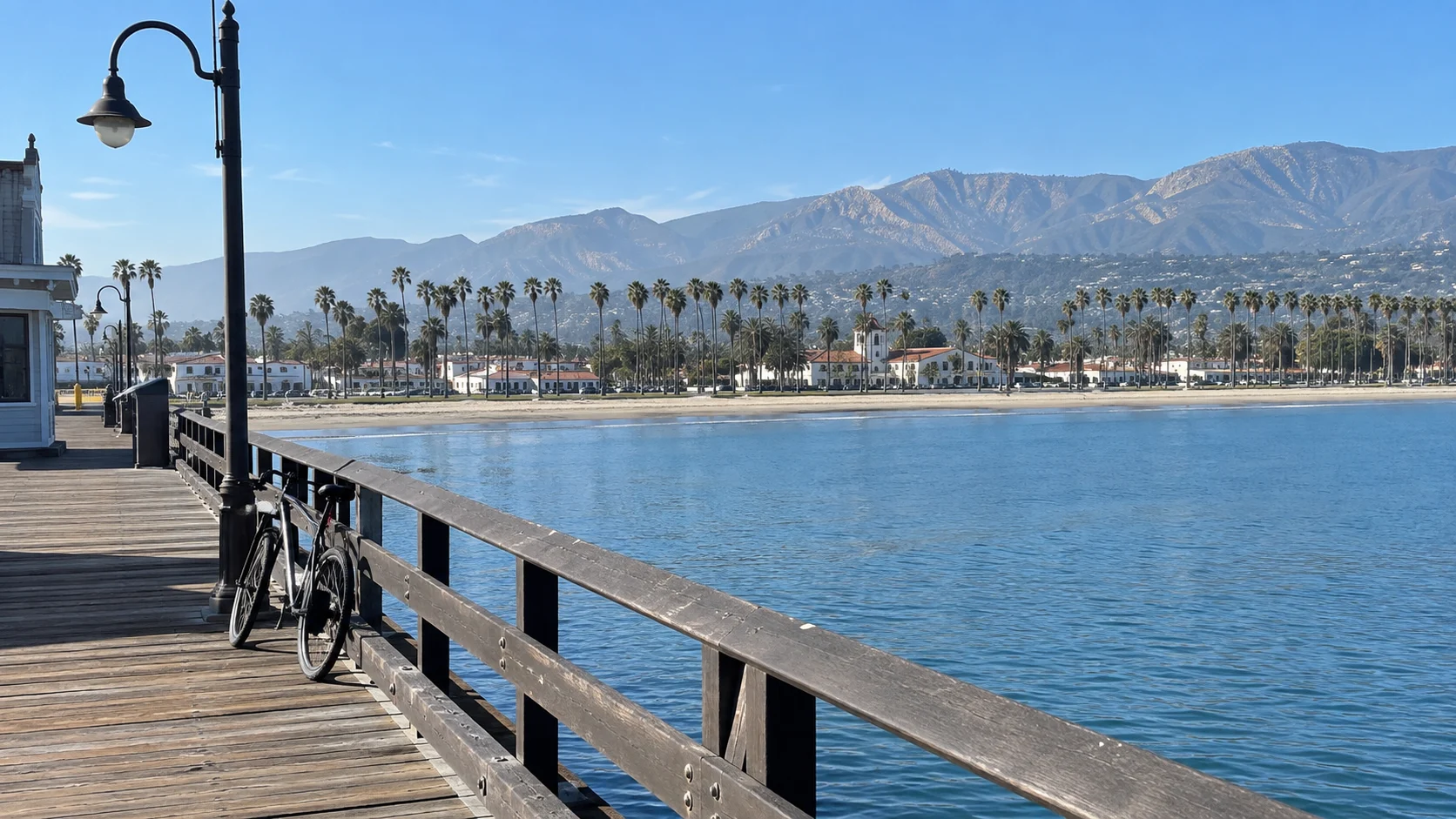 Santa Barbara's palm-lined waterfront and mountains viewed from Stearns Wharf.