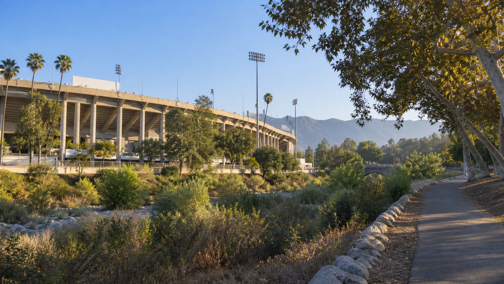 Rose Bowl stadium exterior and surrounding Arroyo Seco park.