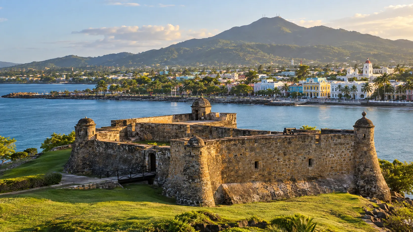 Fortaleza San Felipe overlooking Puerto Plata's harbor, pastel historic center and Mount Isabel de Torres.