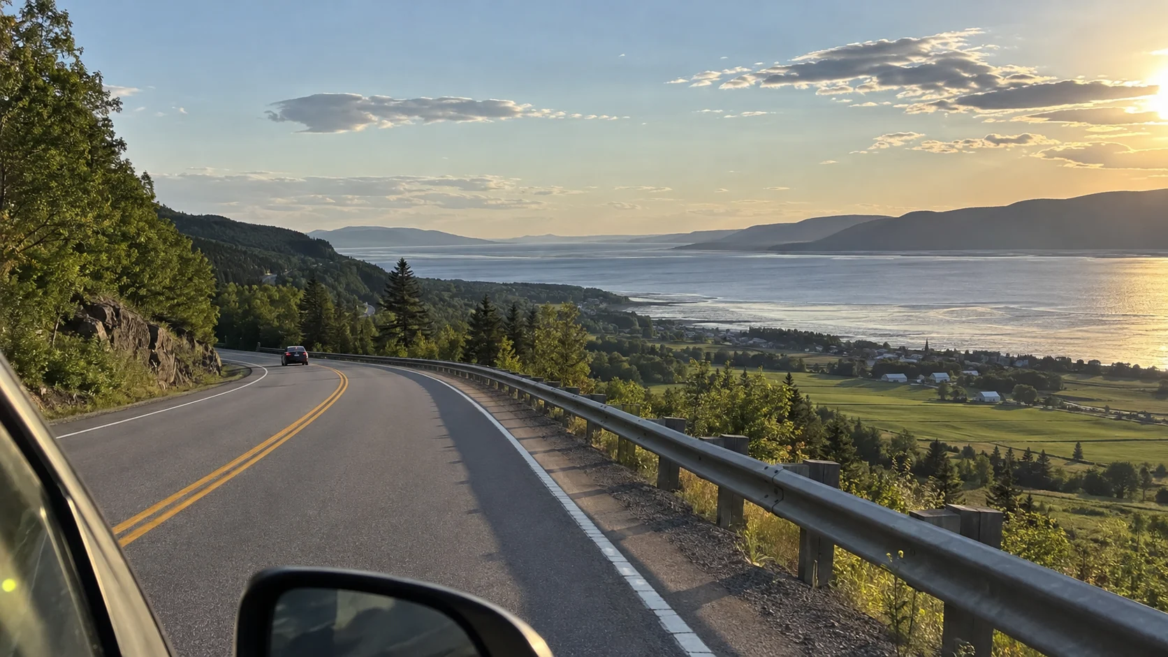 Charlevoix road descending toward the St. Lawrence near Baie-Saint-Paul