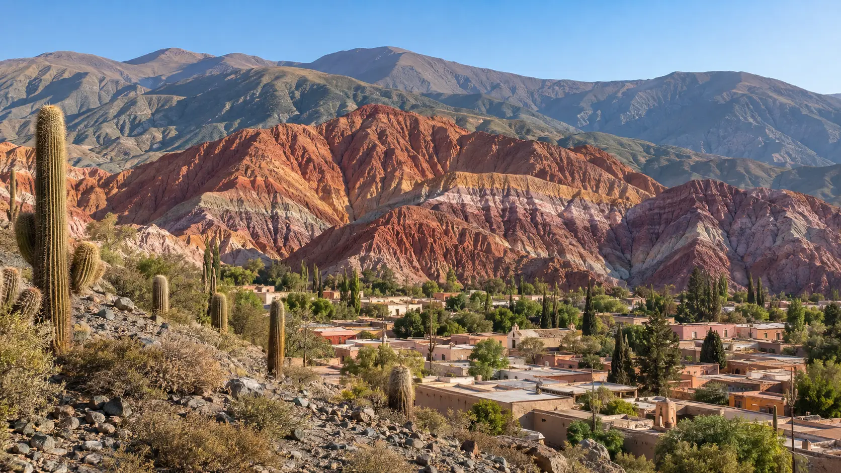 Cerro de los Siete Colores above Purmamarca and cardon cacti in Jujuy