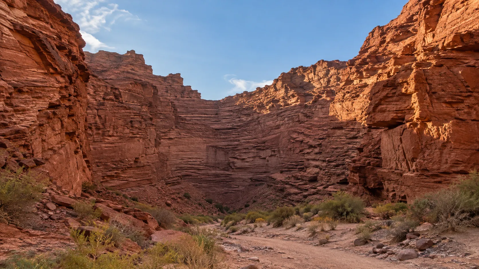Towering red sandstone walls inside Quebrada de las Conchas near Cafayate