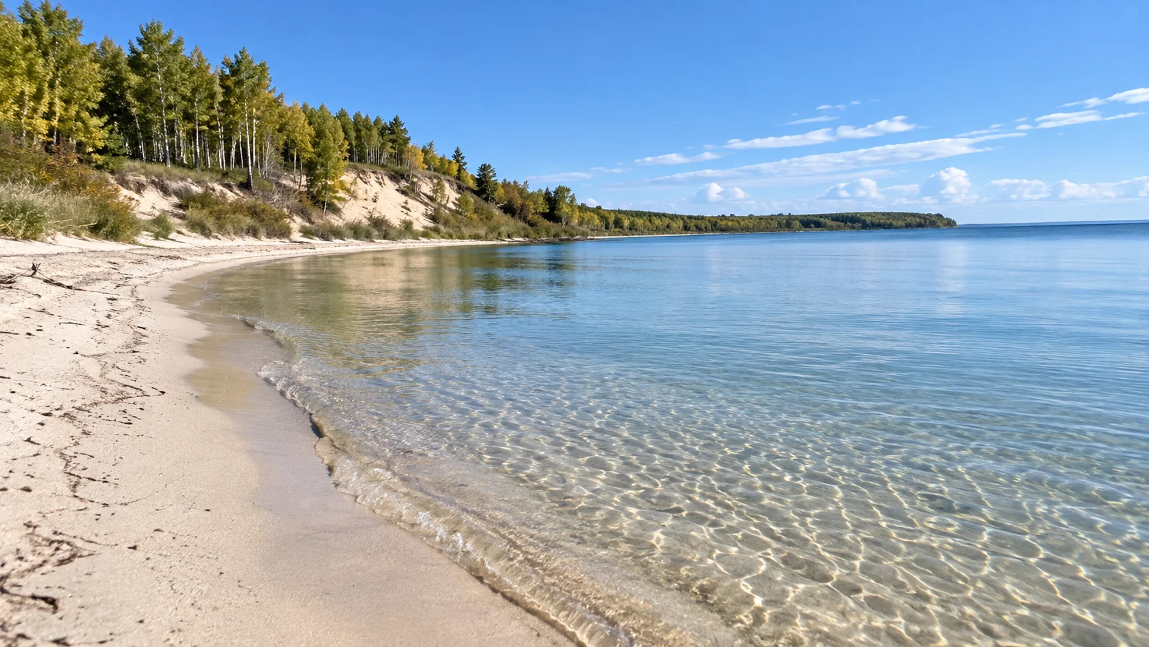 Sandy beach and shallow water at Good Spirit Lake Provincial Park.