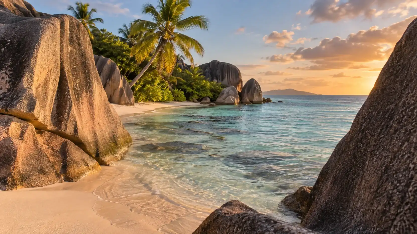 Granite boulders and clear tropical water at Anse Source d'Argent in the Seychelles.