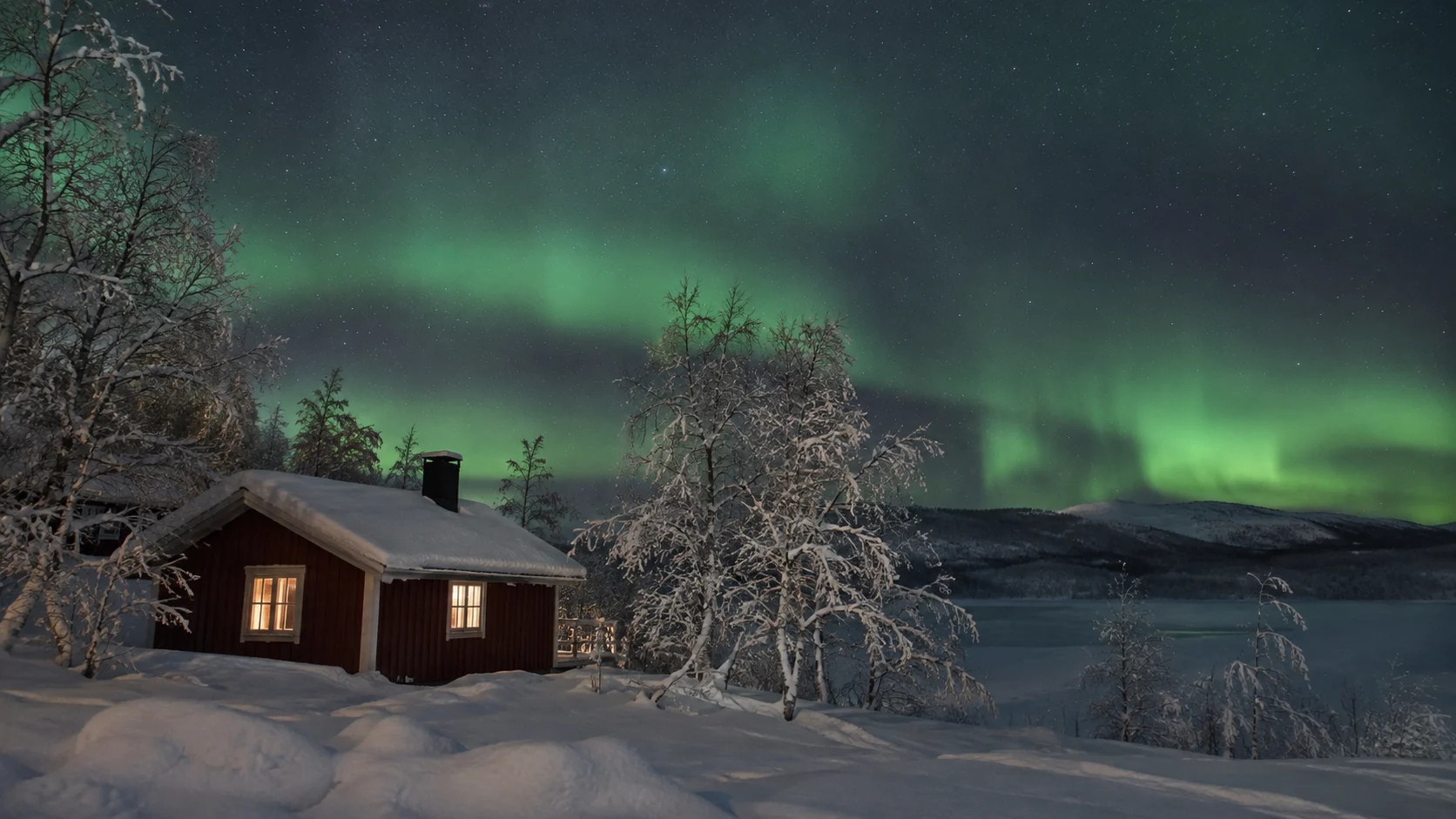 Snowy wilderness and aurora in Swedish Lapland