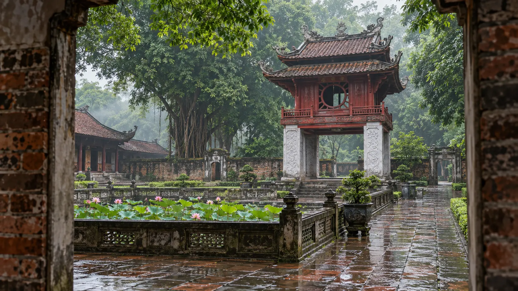 The Khuê Văn Các pavilion and lotus courtyard at Hanoi's Temple of Literature after rain.